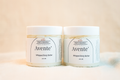 Two jars of Aventé whipped body butter on a light background